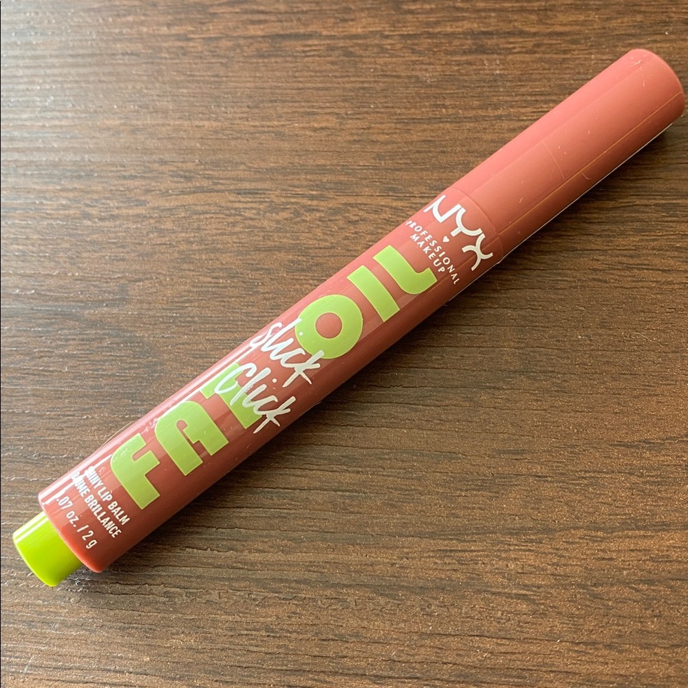 NYX Slick Click Fat Oil Shiny Tinted Lip Balm in Going Viral | Peachy Pink Nude